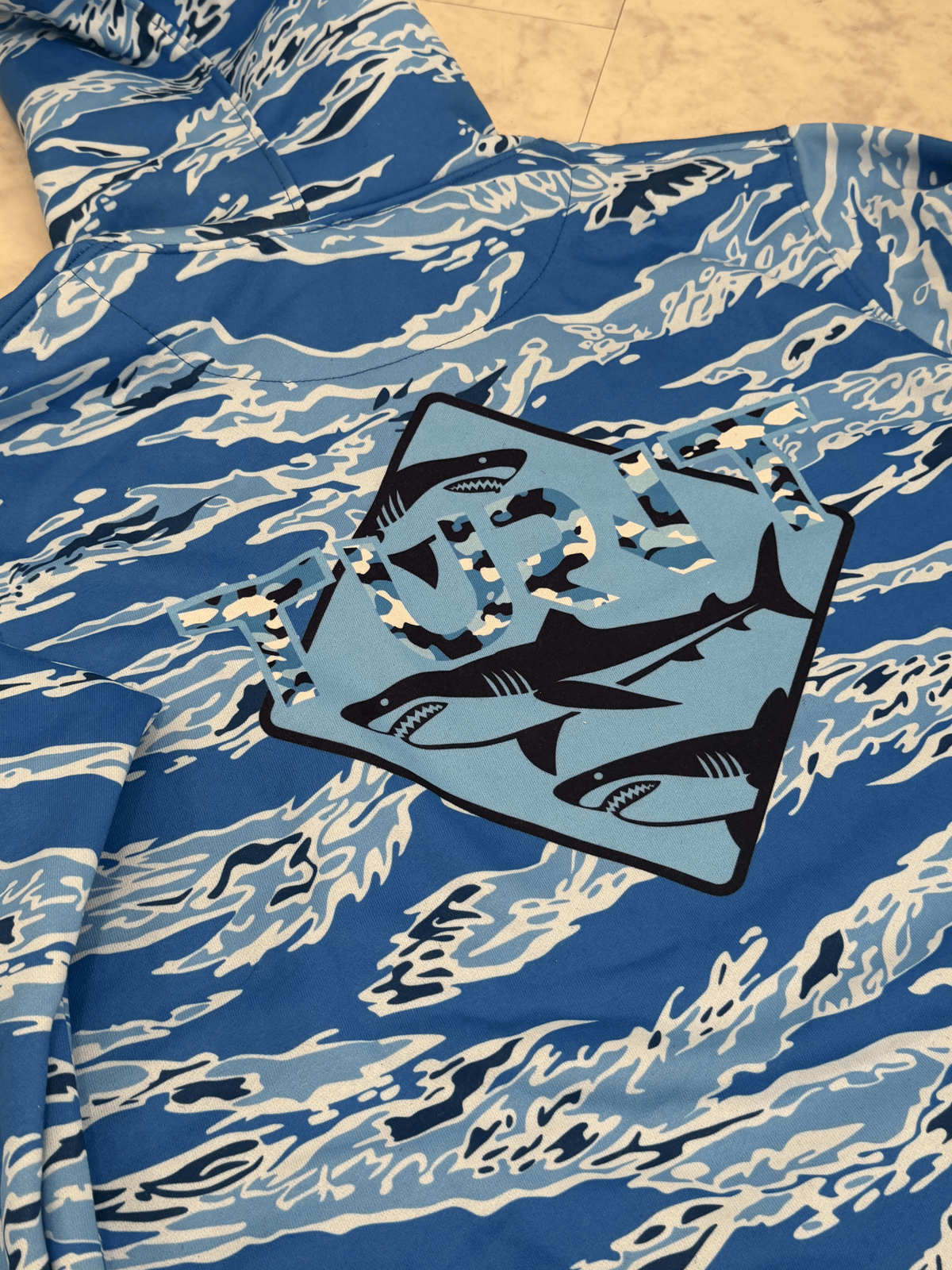 Tiger Camo Blue Shark Hoodie, close-up of back shark graphic